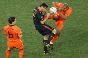 nigel-de-jong-fouls-polish-kid-during-the-training-of-euro-2012-02